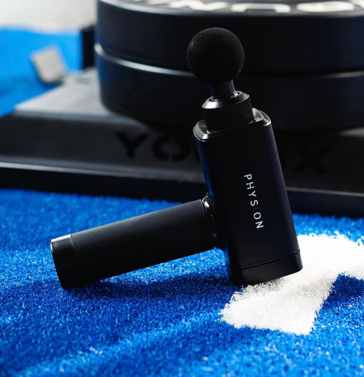 Una pistola de masaje Physion PRO