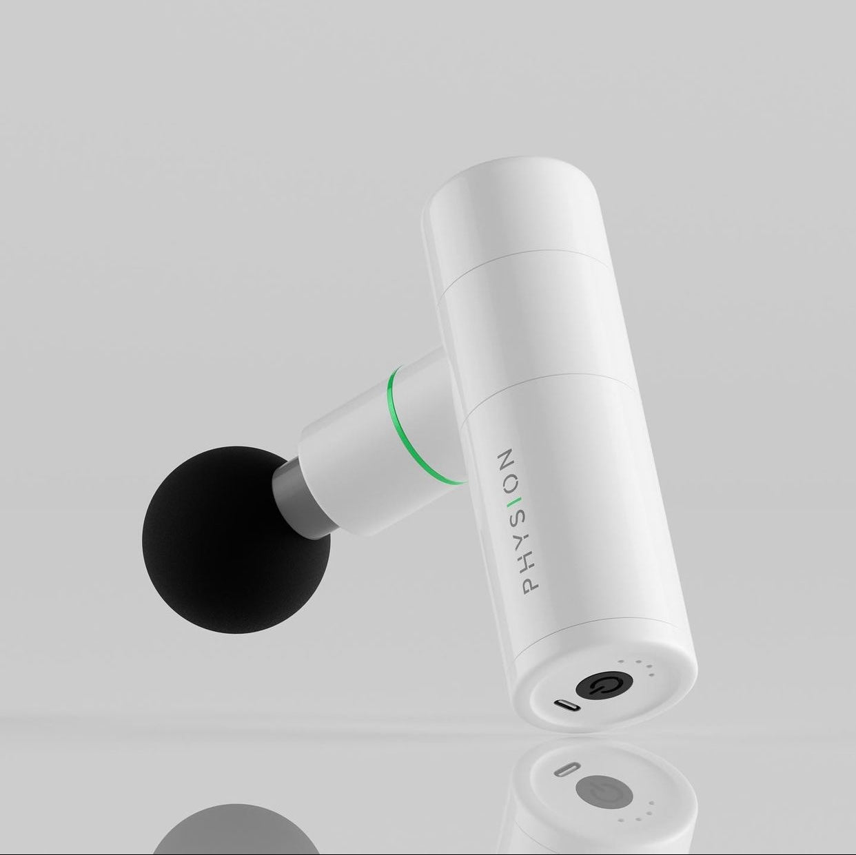 Una mini pistola de masaje Physion