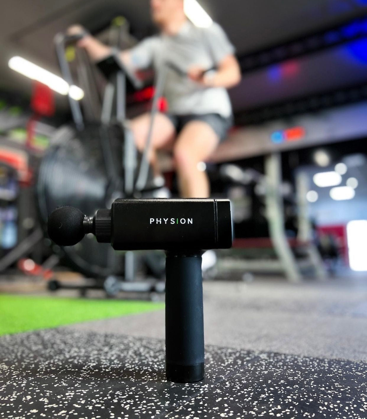 Una pistola de masaje Physion PRO